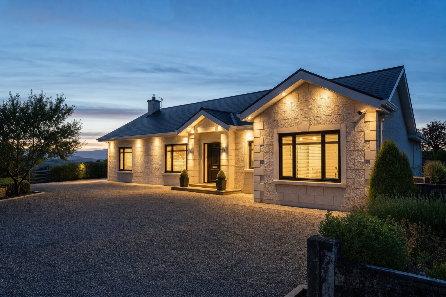 Countryside home at evening with porch and security lighting